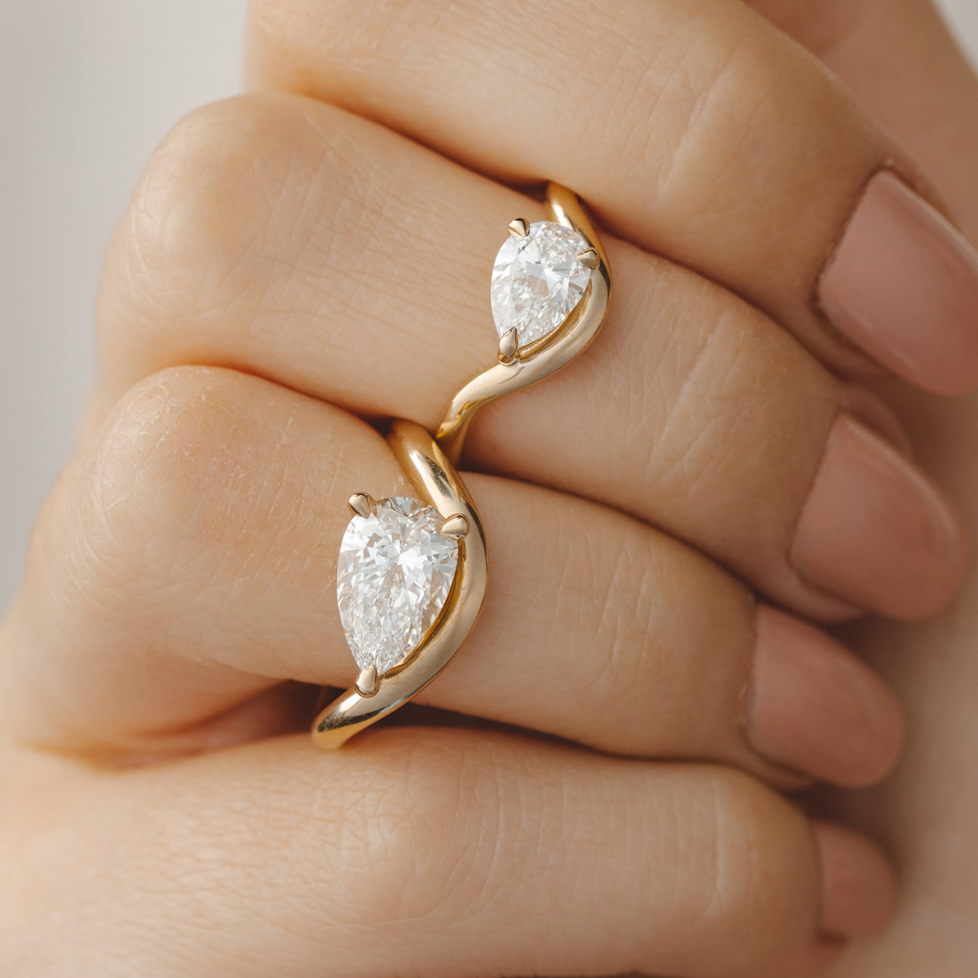 East West Pear Engagement Rings