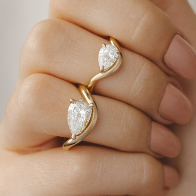 East West Pear Engagement Rings